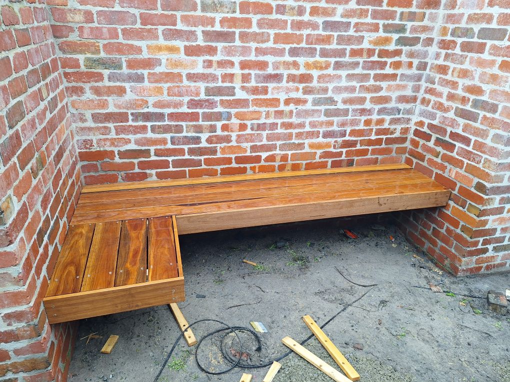 Excavator performing site preparation and earthworks for construction project in Melbourne